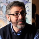 A photo of Warren Spector from 2012.